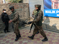 Indian paramilitary troopers patrol near the encounter site in Srinagar, Indian Administered Kashmir, on November 2, 2024. Three militants a...