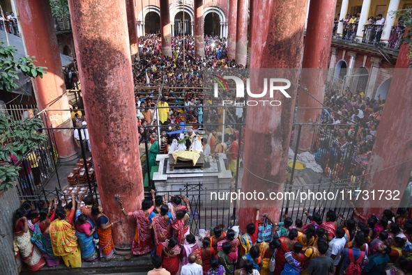 Hindu devotees participate in the 'Annakut' or 'Govardhan Puja' festival at the Madan Mohan temple in Kolkata, India, on November 2, 2024. G...