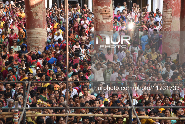 Hindu devotees participate in the 'Annakut' or 'Govardhan Puja' festival at the Madan Mohan temple in Kolkata, India, on November 2, 2024. G...