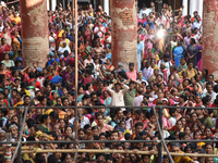 Hindu devotees participate in the 'Annakut' or 'Govardhan Puja' festival at the Madan Mohan temple in Kolkata, India, on November 2, 2024. G...