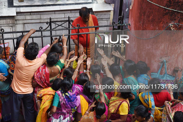 Hindu devotees participate in the 'Annakut' or 'Govardhan Puja' festival at the Madan Mohan temple in Kolkata, India, on November 2, 2024. G...