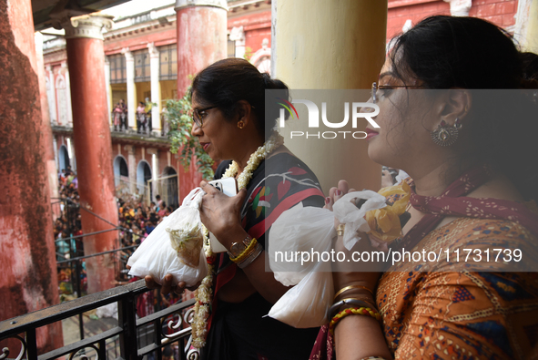 Shashi Panja, Minister of Women and Child Development and Social Welfare of West Bengal, and her daughter Puja Panja participate in the Anna...