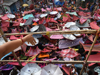 Hindu devotees participate in the 'Annakut' or 'Govardhan Puja' festival at the Madan Mohan temple in Kolkata, India, on November 2, 2024. G...