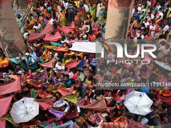 Hindu devotees participate in the 'Annakut' or 'Govardhan Puja' festival at the Madan Mohan temple in Kolkata, India, on November 2, 2024. G...