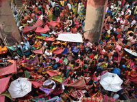 Hindu devotees participate in the 'Annakut' or 'Govardhan Puja' festival at the Madan Mohan temple in Kolkata, India, on November 2, 2024. G...