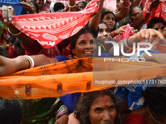 Hindu devotees participate in the 'Annakut' or 'Govardhan Puja' festival at the Madan Mohan temple in Kolkata, India, on November 2, 2024. G...