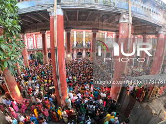 Hindu devotees participate in the 'Annakut' or 'Govardhan Puja' festival at the Madan Mohan temple in Kolkata, India, on November 2, 2024. G...