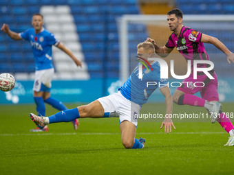 Sam Hughes #5 of Stockport County F.C. is in action during the FA Cup First Round match between Stockport County and Forest Green Rovers at...