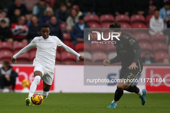 Isaiah Jones of Middlesbrough takes on Luis Binks of Coventry City during the Sky Bet Championship match between Middlesbrough and Coventry...