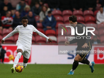 Isaiah Jones of Middlesbrough takes on Luis Binks of Coventry City during the Sky Bet Championship match between Middlesbrough and Coventry...