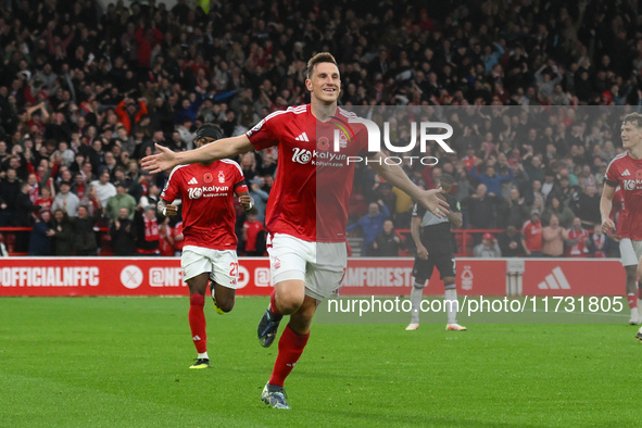 Chris Wood of Nottingham Forest celebrates after scoring a goal to make it 1-0 during the Premier League match between Nottingham Forest and...