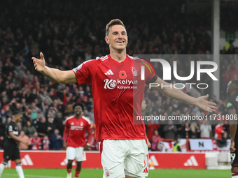 Chris Wood of Nottingham Forest celebrates after scoring a goal to make it 1-0 during the Premier League match between Nottingham Forest and...