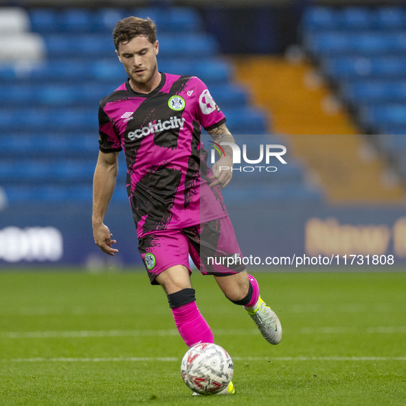 Charlie McCann, number 8 of Forest Green Rovers F.C., participates in the FA Cup First Round match between Stockport County and Forest Green...