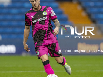 Charlie McCann, number 8 of Forest Green Rovers F.C., participates in the FA Cup First Round match between Stockport County and Forest Green...