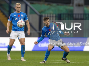 Oliver Norwood #26 of Stockport County F.C. is in action during the FA Cup First Round match between Stockport County and Forest Green Rover...