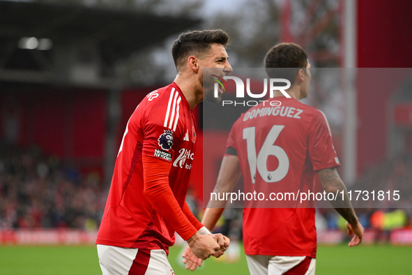 Alex Moreno of Nottingham Forest celebrates after Chris Wood of Nottingham Forest scores a goal during the Premier League match between Nott...