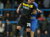 Dale Taylor of Wigan Athletic heads the ball during the FA Cup First Round match between Carlisle United and Wigan Athletic at Brunton Park...