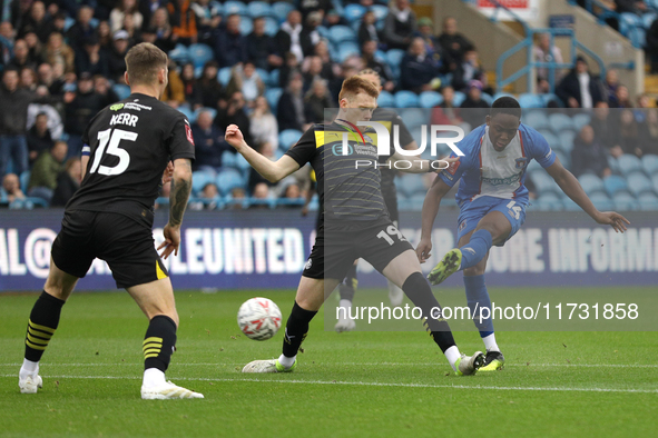 Daniel Adu-Adjei of Carlisle United takes a shot at goal during the FA Cup First Round match between Carlisle United and Wigan Athletic at B...