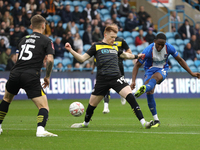 Daniel Adu-Adjei of Carlisle United takes a shot at goal during the FA Cup First Round match between Carlisle United and Wigan Athletic at B...