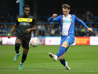 Taylor Charters of Carlisle United crosses the ball during the FA Cup First Round match between Carlisle United and Wigan Athletic at Brunto...