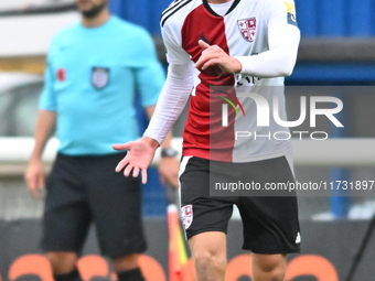 Jamie Andrews (6 Woking) goes forward during the FA Cup First Round match between Woking and Cambridge United at the Kingfield Stadium in Wo...