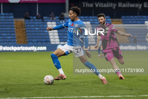 Odin Bailey, number 27 of Stockport County F.C., stretches for the ball during the FA Cup First Round match between Stockport County and For...