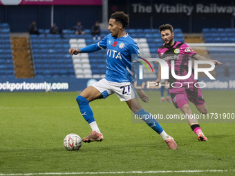 Odin Bailey, number 27 of Stockport County F.C., stretches for the ball during the FA Cup First Round match between Stockport County and For...