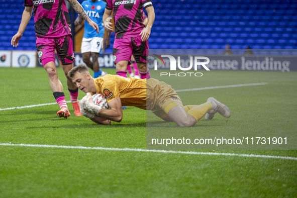 Jamie Searle #20 (GK) of Forest Green Rovers F.C. makes a save during the FA Cup First Round match between Stockport County and Forest Green...