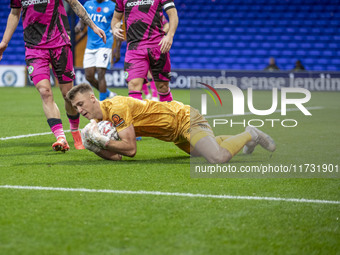 Jamie Searle #20 (GK) of Forest Green Rovers F.C. makes a save during the FA Cup First Round match between Stockport County and Forest Green...