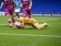 Jamie Searle #20 (GK) of Forest Green Rovers F.C. makes a save during the FA Cup First Round match between Stockport County and Forest Green...