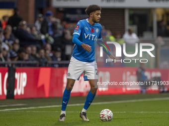 Tyler Onyango, number 24 of Stockport County F.C., is in action during the FA Cup First Round match between Stockport County and Forest Gree...