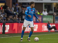 Tyler Onyango, number 24 of Stockport County F.C., is in action during the FA Cup First Round match between Stockport County and Forest Gree...