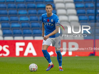 Fraser Horsfall, number 6 of Stockport County F.C., participates in the FA Cup First Round match between Stockport County and Forest Green R...