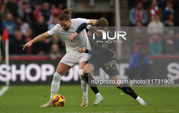 Victor Torp of Coventry City challenges Luke Ayling of Middlesbrough during the Sky Bet Championship match between Middlesbrough and Coventr...