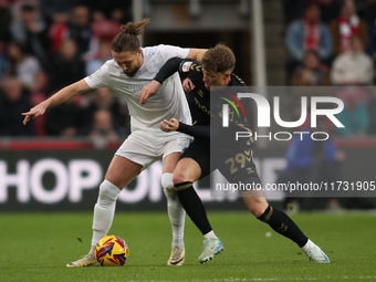 Victor Torp of Coventry City challenges Luke Ayling of Middlesbrough during the Sky Bet Championship match between Middlesbrough and Coventr...