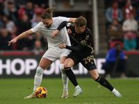 Victor Torp of Coventry City challenges Luke Ayling of Middlesbrough during the Sky Bet Championship match between Middlesbrough and Coventr...