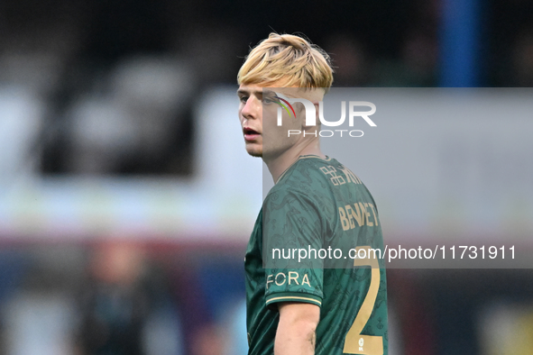 Liam Bennet (2 Cambridge United) looks on during the FA Cup First Round match between Woking and Cambridge United at the Kingfield Stadium i...