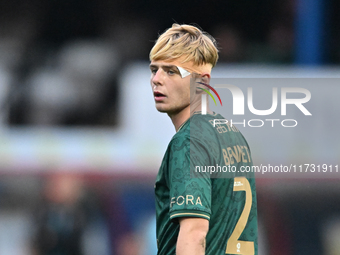 Liam Bennet (2 Cambridge United) looks on during the FA Cup First Round match between Woking and Cambridge United at the Kingfield Stadium i...