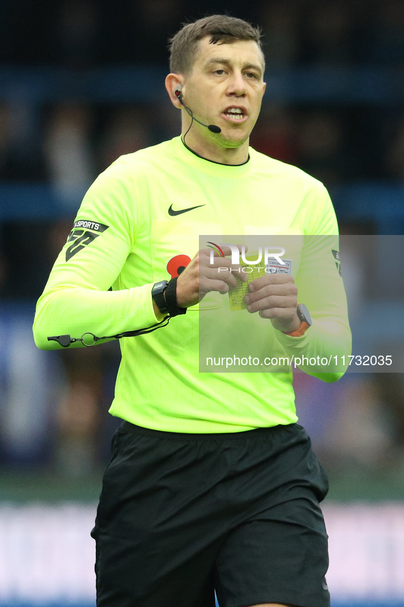 Referee Martin Woods officiates the FA Cup First Round match between Carlisle United and Wigan Athletic at Brunton Park in Carlisle, United...