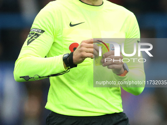 Referee Martin Woods officiates the FA Cup First Round match between Carlisle United and Wigan Athletic at Brunton Park in Carlisle, United...