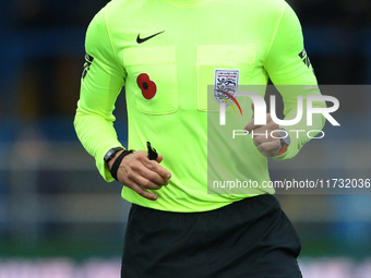 Referee Martin Woods officiates the FA Cup First Round match between Carlisle United and Wigan Athletic at Brunton Park in Carlisle, United...