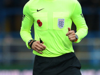 Referee Martin Woods officiates the FA Cup First Round match between Carlisle United and Wigan Athletic at Brunton Park in Carlisle, United...