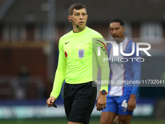 Referee Martin Woods officiates the FA Cup First Round match between Carlisle United and Wigan Athletic at Brunton Park in Carlisle, United...