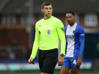 Referee Martin Woods officiates the FA Cup First Round match between Carlisle United and Wigan Athletic at Brunton Park in Carlisle, United...