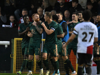 James Brophy (7, Cambridge United) celebrates after scoring the team's first goal during the FA Cup First Round match between Woking and Cam...