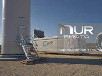 A large crane assembles a wind turbine in the rolling hills of Castelluccio dei Sauri, Foggia, Italy, on November 1, 2024. This wind farm ex...