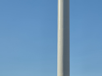 A large crane assembles a wind turbine in the rolling hills of Castelluccio dei Sauri, Foggia, Italy, on November 1, 2024. This wind farm ex...