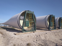 A large crane assembles a wind turbine in the rolling hills of Castelluccio dei Sauri, Foggia, Italy, on November 1, 2024. This wind farm ex...