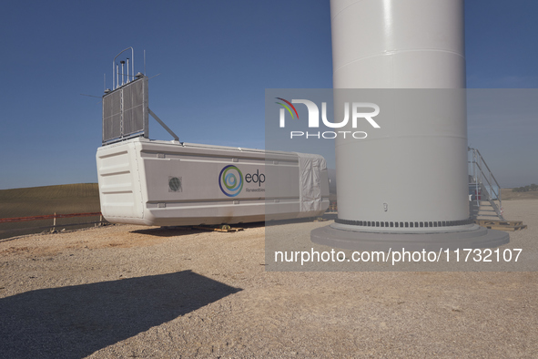 A large crane assembles a wind turbine in the rolling hills of Castelluccio dei Sauri, Foggia, Italy, on November 1, 2024. This wind farm ex...