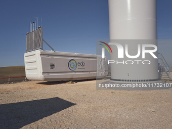 A large crane assembles a wind turbine in the rolling hills of Castelluccio dei Sauri, Foggia, Italy, on November 1, 2024. This wind farm ex...